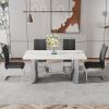 Modern minimalist dining table. White imitation marble glass sticker desktop, stainless steel legs, stable and beautiful. Suitable for living room and