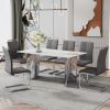Modern minimalist dining table. White imitation marble glass sticker desktop, stainless steel legs, stable and beautiful. Suitable for living room and