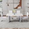 Modern minimalist dining table. White imitation marble glass sticker desktop, stainless steel legs, stable and beautiful. Suitable for living room and